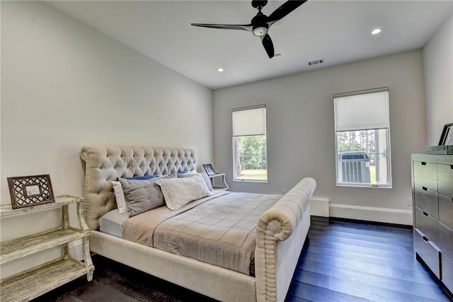bedroom with visible vents, dark wood-style flooring, baseboards, ceiling fan, and recessed lighting