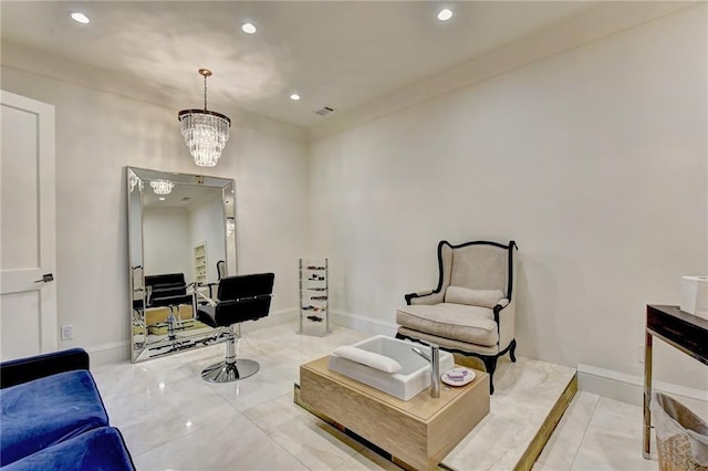 living area featuring recessed lighting, baseboards, and a notable chandelier