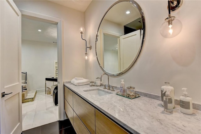 bathroom featuring vanity, recessed lighting, and marble finish floor