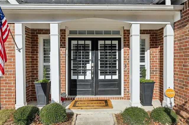 entrance to property featuring french doors