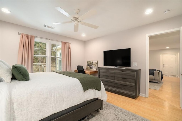 bedroom featuring ceiling fan and hardwood / wood-style flooring