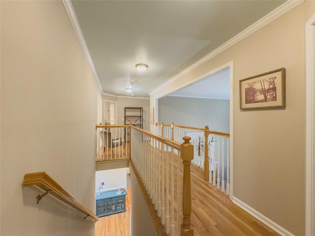 710 Bentgrass Ct, Dacula, GA 30019 - corridor with an upstairs landing, crown molding, and wood finished floors