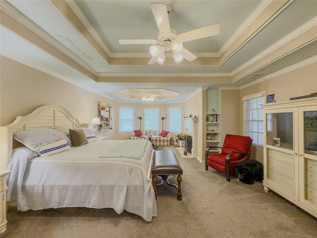 710 Bentgrass Ct, Dacula, GA 30019 - bedroom featuring a raised ceiling, multiple windows, carpet floors, crown molding, and a ceiling fan