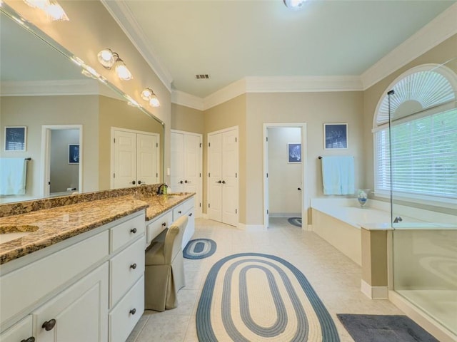710 Bentgrass Ct, Dacula, GA 30019 - bathroom with a bath, vanity, ornamental molding, and tile patterned flooring