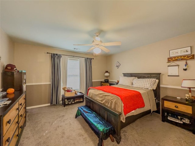 710 Bentgrass Ct, Dacula, GA 30019 - carpeted bedroom with ceiling fan and baseboards