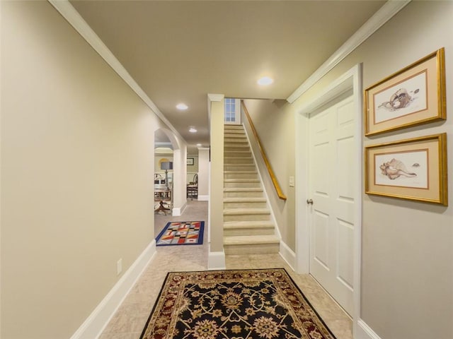 710 Bentgrass Ct, Dacula, GA 30019 - stairway with arched walkways, recessed lighting, and ornamental molding