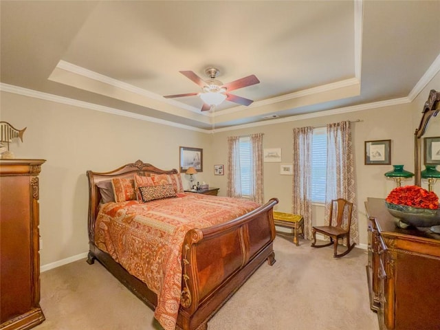 710 Bentgrass Ct, Dacula, GA 30019 - bedroom featuring a raised ceiling, light colored carpet, crown molding, and ceiling fan