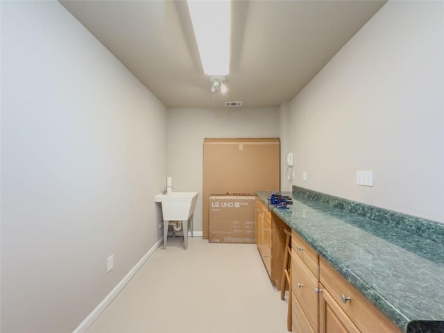 710 Bentgrass Ct, Dacula, GA 30019 - laundry area with baseboards and light colored carpet