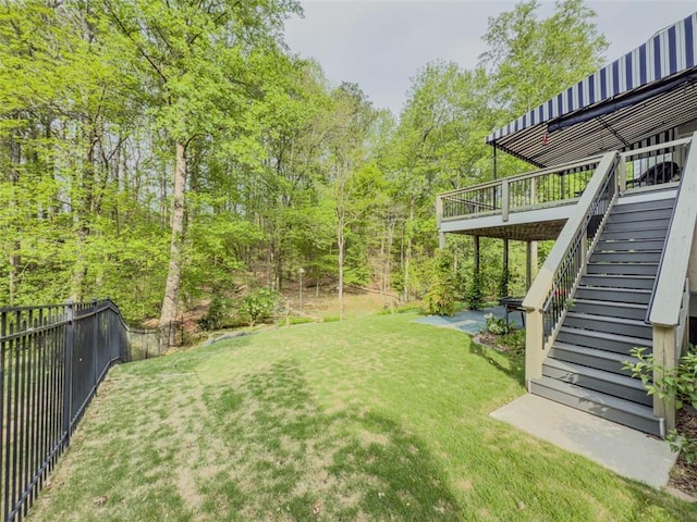 710 Bentgrass Ct, Dacula, GA 30019 - fenced backyard with stairs and a wooden deck