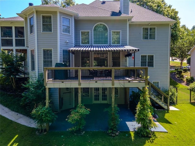 710 Bentgrass Ct, Dacula, GA 30019 - back of property with a patio area, a wooden deck, a yard, a chimney, and stairs