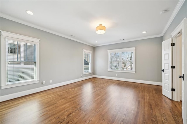 unfurnished bedroom featuring wood finished floors, baseboards, ornamental molding, and recessed lighting