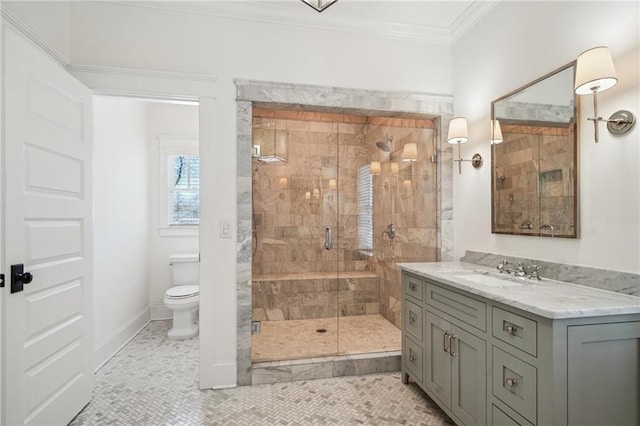 bathroom with vanity, a stall shower, tile patterned flooring, crown molding, and toilet