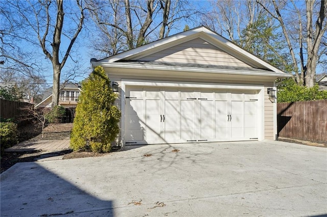 detached garage with fence