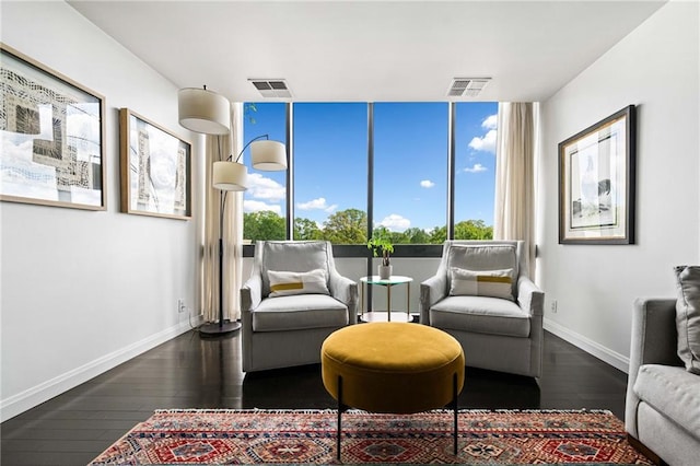145 15th St NE Unit 435, Atlanta, GA 30309 - living area featuring baseboards and dark wood finished floors