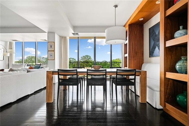 145 15th St NE Unit 435, Atlanta, GA 30309 - dining area with dark wood finished floors and floor to ceiling windows