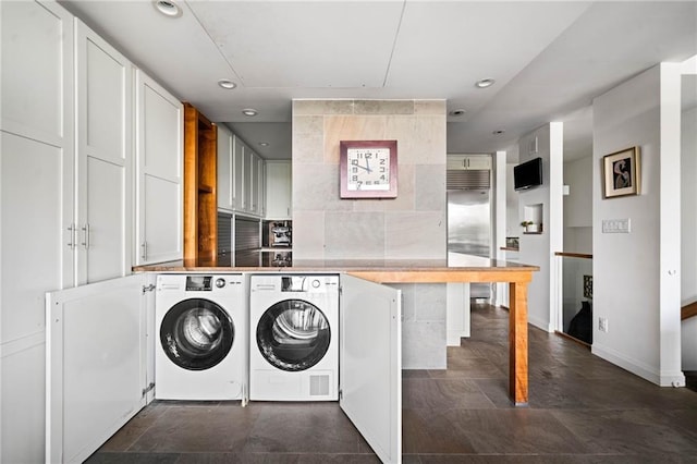 145 15th St NE Unit 435, Atlanta, GA 30309 - laundry area featuring independent washer and dryer, recessed lighting, and baseboards