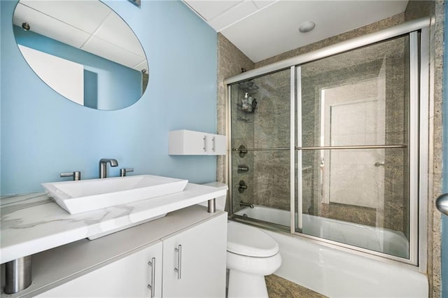 145 15th St NE Unit 435, Atlanta, GA 30309 - bathroom with toilet, bath / shower combo with glass door, and vanity