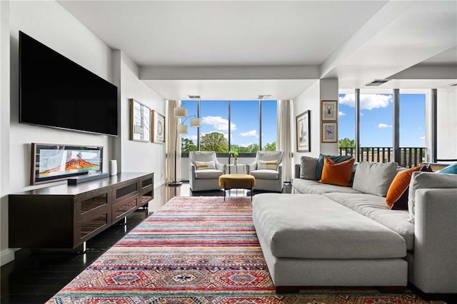 145 15th St NE Unit 435, Atlanta, GA 30309 - living area featuring wood finished floors and healthy amount of natural light
