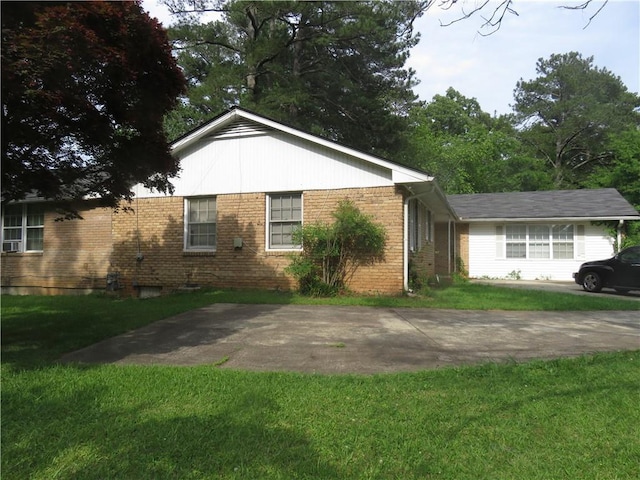 2447 Omaha Rd SW, Atlanta, GA 30331 - view of front of house featuring brick siding and a front lawn