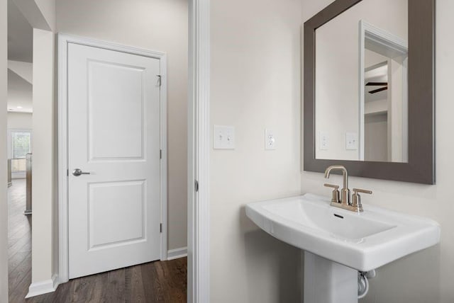 bathroom featuring sink and hardwood / wood-style floors