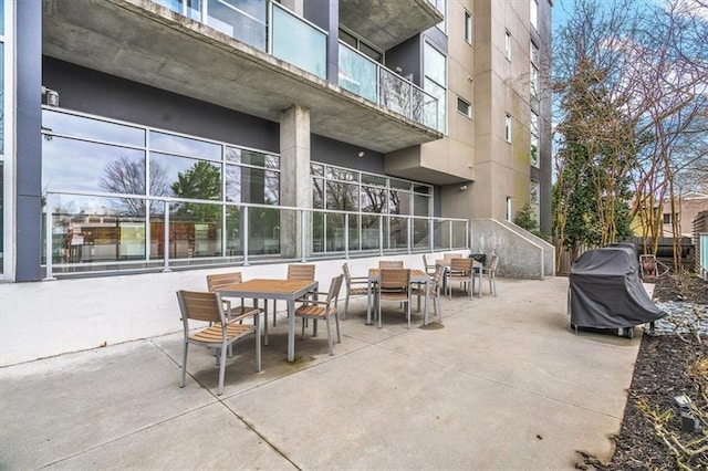 view of patio featuring a grill