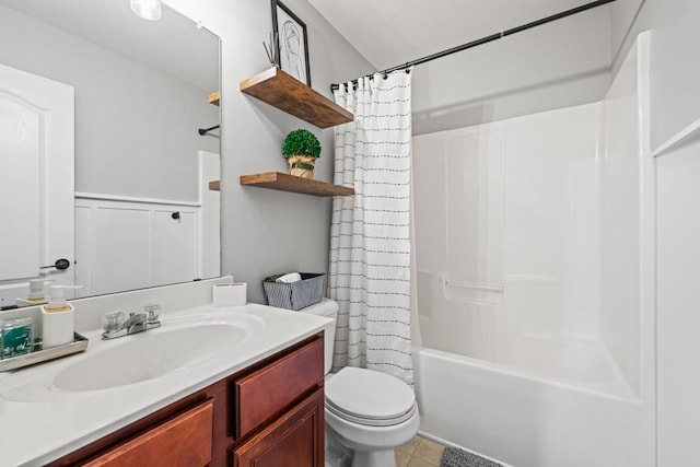 full bathroom with shower / bath combination with curtain, vanity, and toilet