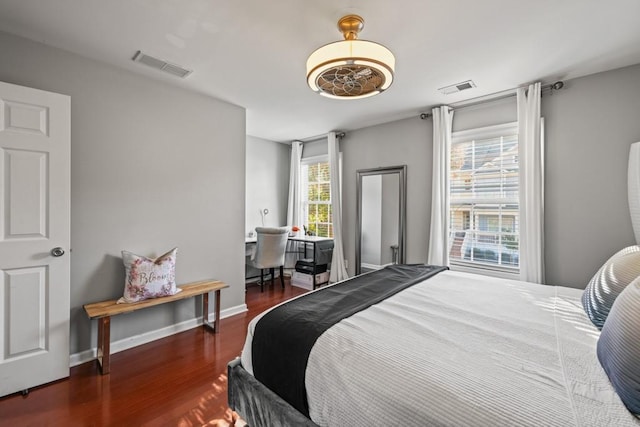 bedroom featuring dark wood-type flooring