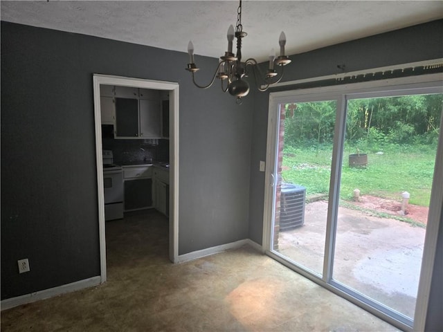 1203 Balboa Ct, Norcross, GA 30093 - unfurnished dining area featuring a chandelier and baseboards