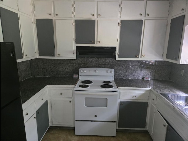 1203 Balboa Ct, Norcross, GA 30093 - kitchen with electric range, under cabinet range hood, freestanding refrigerator, backsplash, and white cabinetry