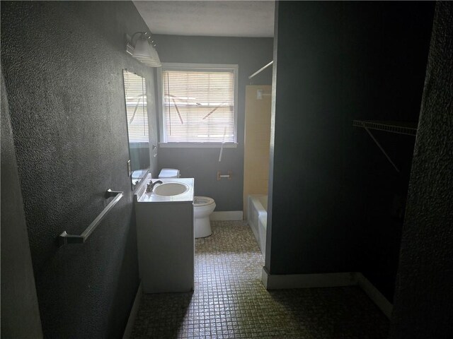 1203 Balboa Ct, Norcross, GA 30093 - full bath with toilet, vanity, a textured wall, tub / shower combination, and tile patterned flooring