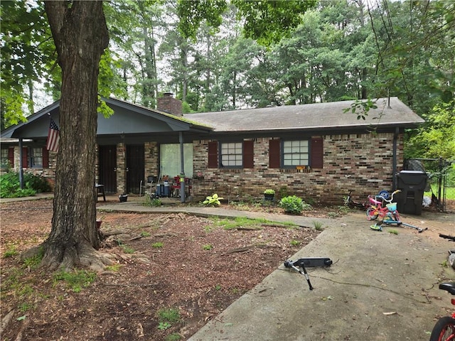 1203 Balboa Ct, Norcross, GA 30093 - view of front of property featuring a chimney and brick siding