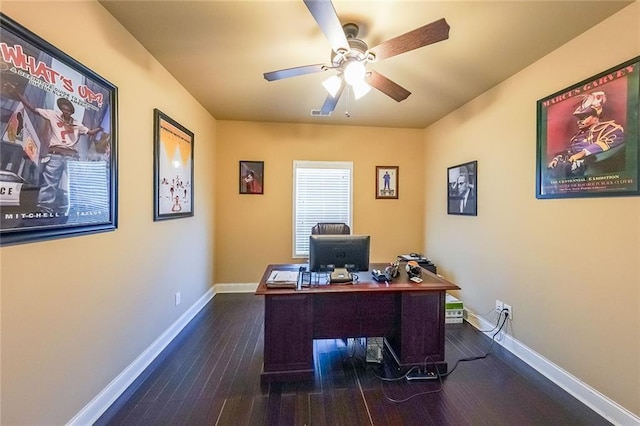 home office with a ceiling fan, baseboards, and wood finished floors