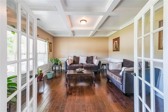 sitting room featuring coffered ceiling, dark wood-type flooring, and french doors