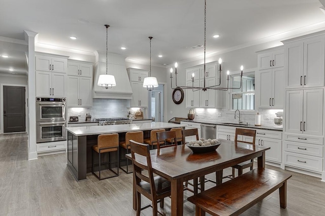1889 Jefferson River Rd, Jefferson, GA 30549 - dining area with ornamental molding, recessed lighting, and light wood-style floors