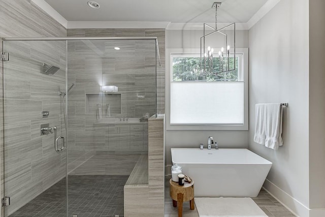 1889 Jefferson River Rd, Jefferson, GA 30549 - bathroom with a freestanding tub, a chandelier, a shower stall, and ornamental molding