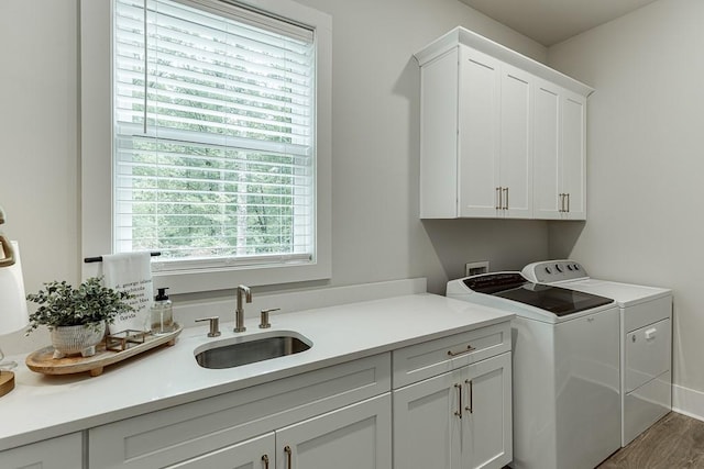 1889 Jefferson River Rd, Jefferson, GA 30549 - washroom featuring cabinet space, independent washer and dryer, and wood finished floors