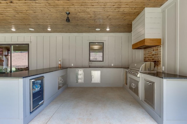 1889 Jefferson River Rd, Jefferson, GA 30549 - kitchen featuring beverage cooler, wood ceiling, white cabinetry, and a peninsula