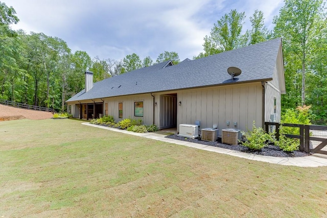 1889 Jefferson River Rd, Jefferson, GA 30549 - back of property with a chimney and roof with shingles