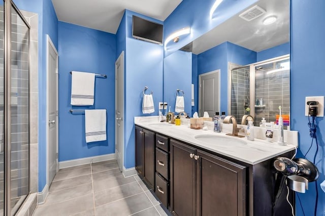 386 Summersong Pl, Talmo, GA 30575 - bathroom with tile patterned floors, a shower stall, and double vanity