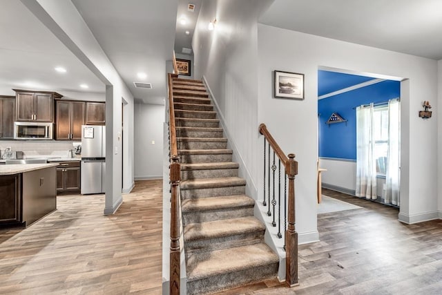 386 Summersong Pl, Talmo, GA 30575 - staircase featuring wood finished floors and recessed lighting