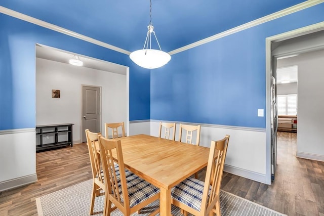 386 Summersong Pl, Talmo, GA 30575 - dining space featuring wood finished floors and ornamental molding