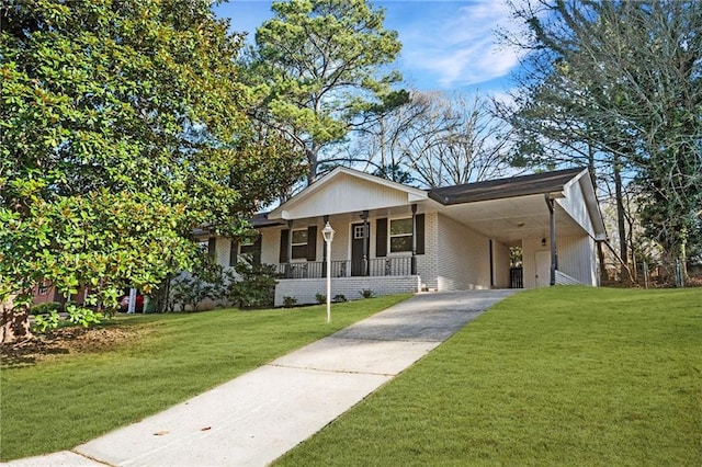 2198 Star Mist Dr SW, Atlanta, GA 30311 - ranch-style home with driveway, a front yard, covered porch, and an attached carport