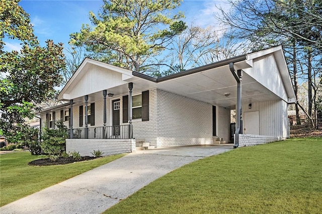 2198 Star Mist Dr SW, Atlanta, GA 30311 - view of front of property featuring concrete driveway, a front lawn, a porch, a carport, and brick siding