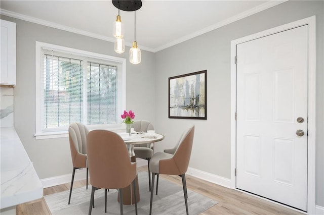 2198 Star Mist Dr SW, Atlanta, GA 30311 - dining room with light wood-type flooring and crown molding
