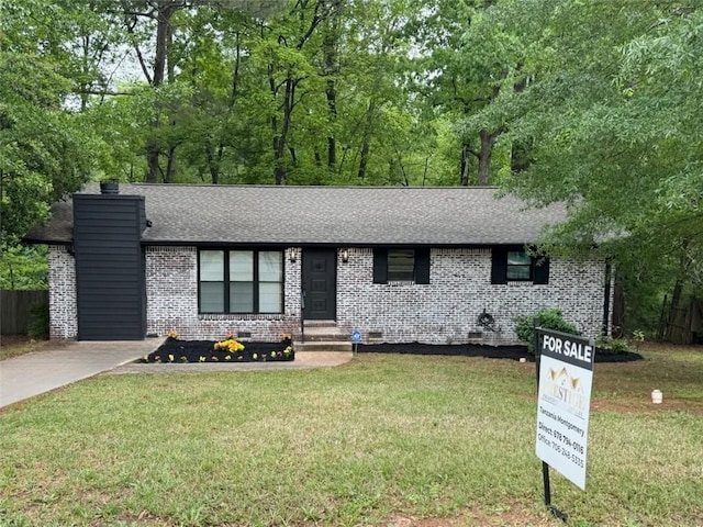 7994 Devonshire Dr, Jonesboro, GA 30238 - single story home featuring a front yard, brick siding, roof with shingles, and crawl space