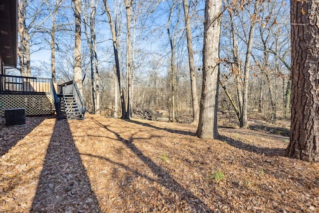 7994 Devonshire Dr, Jonesboro, GA 30238 - view of yard with a wooden deck and stairs