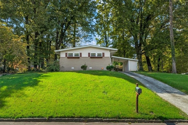 ranch-style home with a front lawn