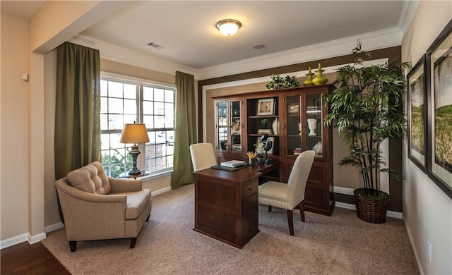 office area with visible vents, baseboards, and ornamental molding