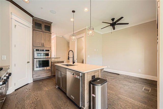 504 E Howard Ave, Decatur, GA 30030 - kitchen featuring appliances with stainless steel finishes, dark wood-style flooring, ceiling fan, recessed lighting, and light countertops