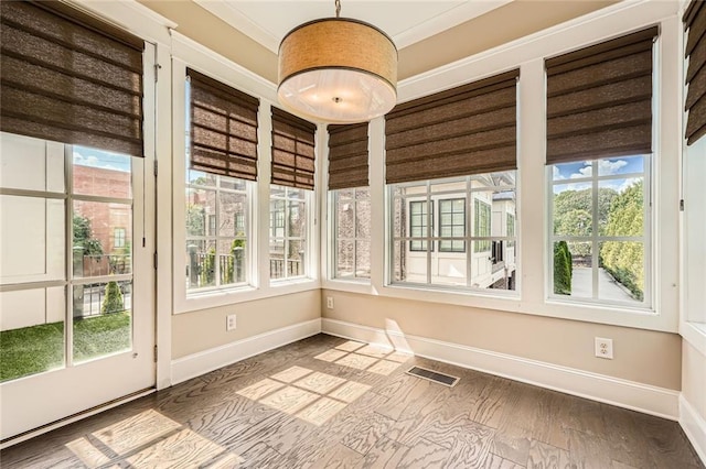 504 E Howard Ave, Decatur, GA 30030 - unfurnished sunroom featuring plenty of natural light and wood finished floors